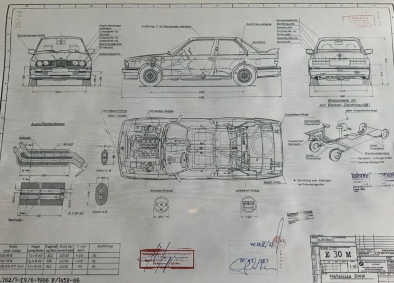 Photo d'un plan papier d'encombrement de la BMW M3 E30 avec details et tampons des differents services du bureau d'étude