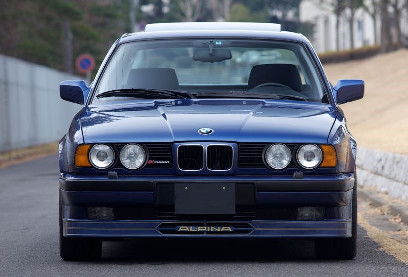 Alpina B10 Biturbo face avant avec double optique et signature Alpina