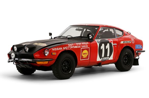 Datsun 240Z engagée en rallye africain dans les années 1970 avec livrée Nissan Motorsports