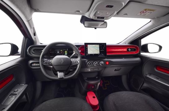 Intérieur Renault Twingo E-Tech avec écran central et planche de bord colorée