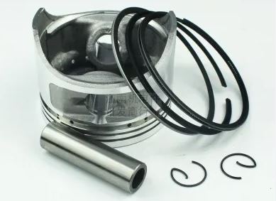 piston moteur démonté avec axe de piston circlips et segments