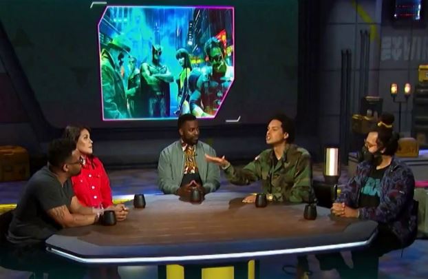 Personnes en discussion autour d’une table avec interruption de parole