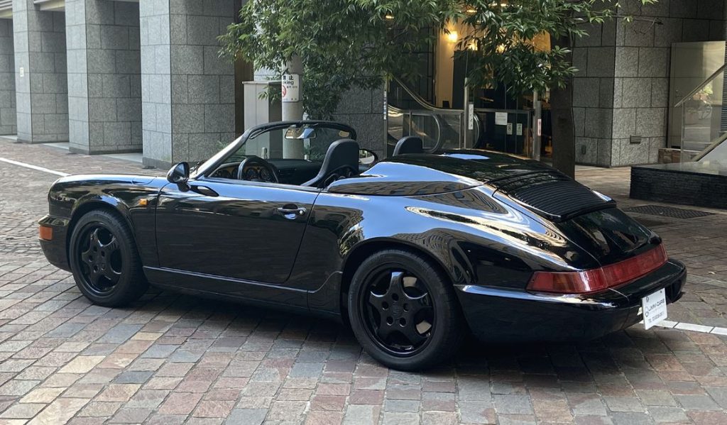 Porsche 911 964 Speedster noire vue arrière double bossage