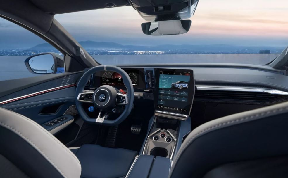 Intérieur numérique de l’Alpine A390 avec écran central et cockpit sportif