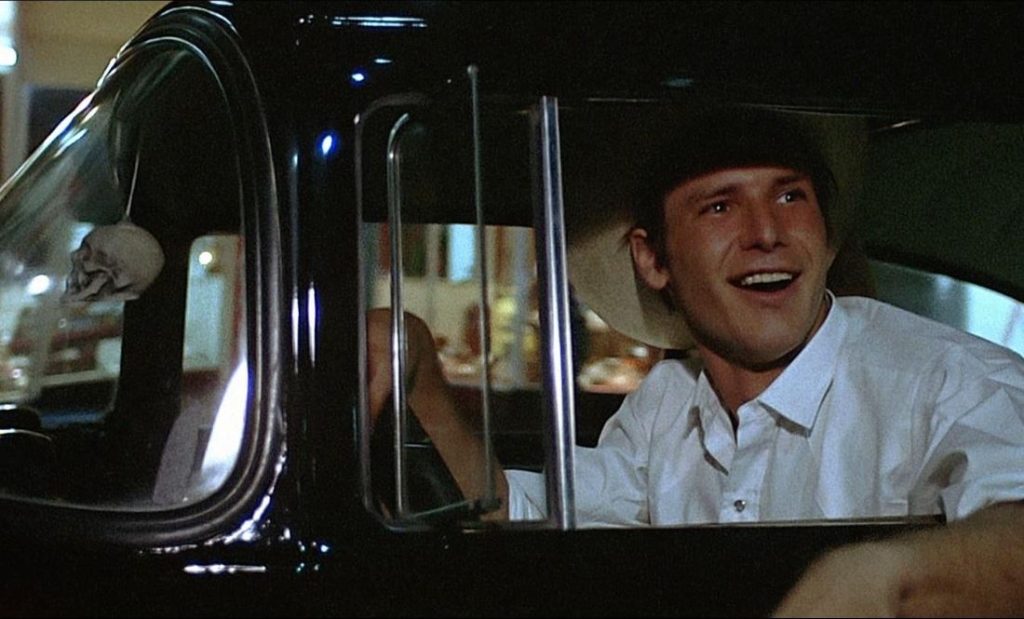 Harrison Ford au volant d'une Chevrolet dans le film American Graffiti (1973)