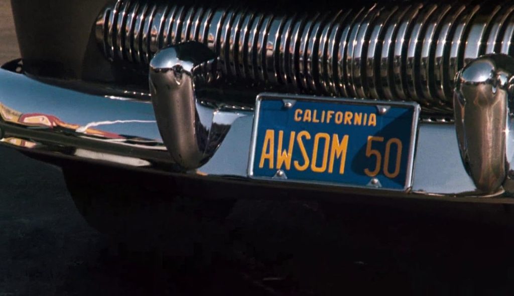 Calandre et plaque « AWSOM 50 » de la Mercury des voitures de Cobra