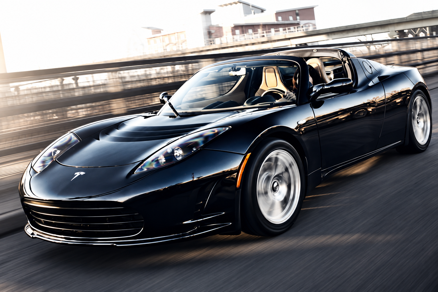 Tesla Roadster 2008 noir vu de trois quarts avant en mouvement